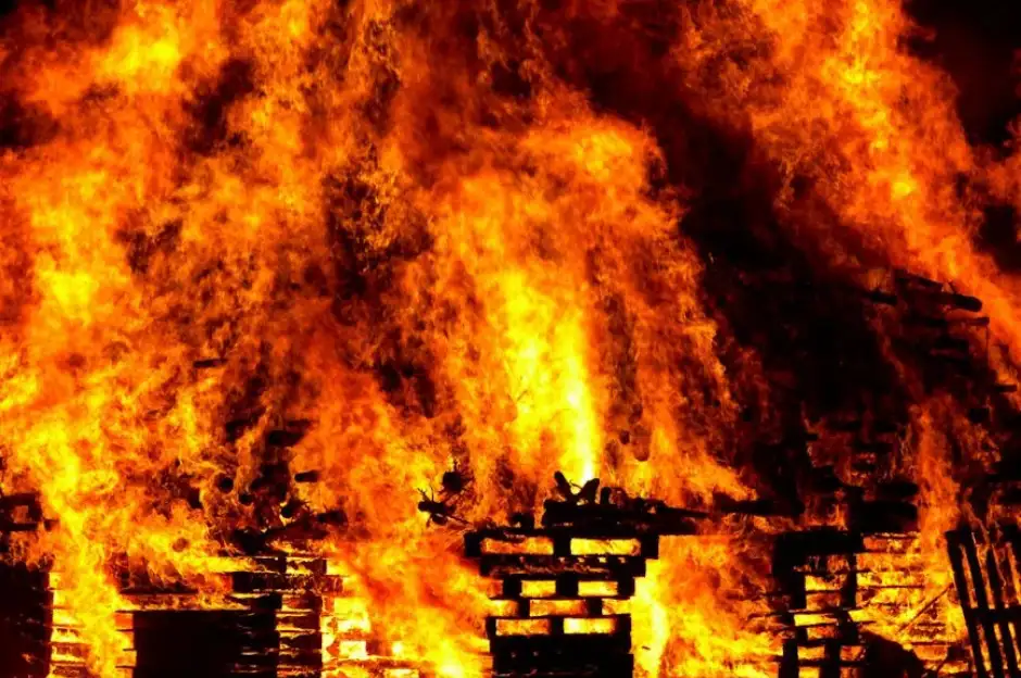 A house on fire, just like the flames when your startup goes up in flames with lack of funding