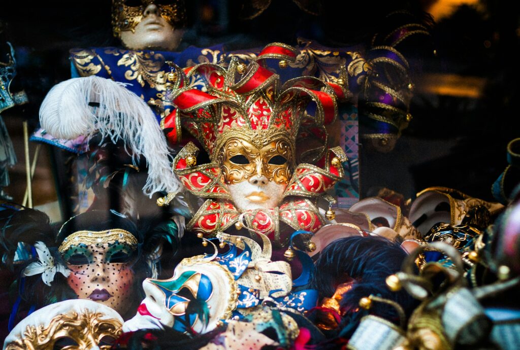 a collection of masks, sybolizing the masking of authentic communication.